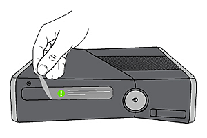 Новая консоль Xbox 360. Снимите защитную пленку, покрывающую консоль