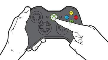Указательный палец нажимает кнопку Guide на геймпаде Xbox 360.